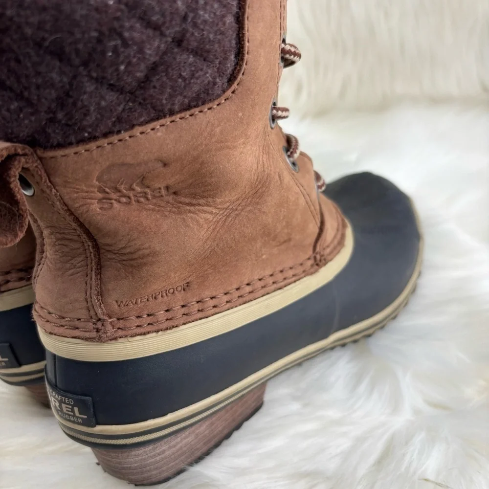 Sorel Tan and Black Lace-Up Boots